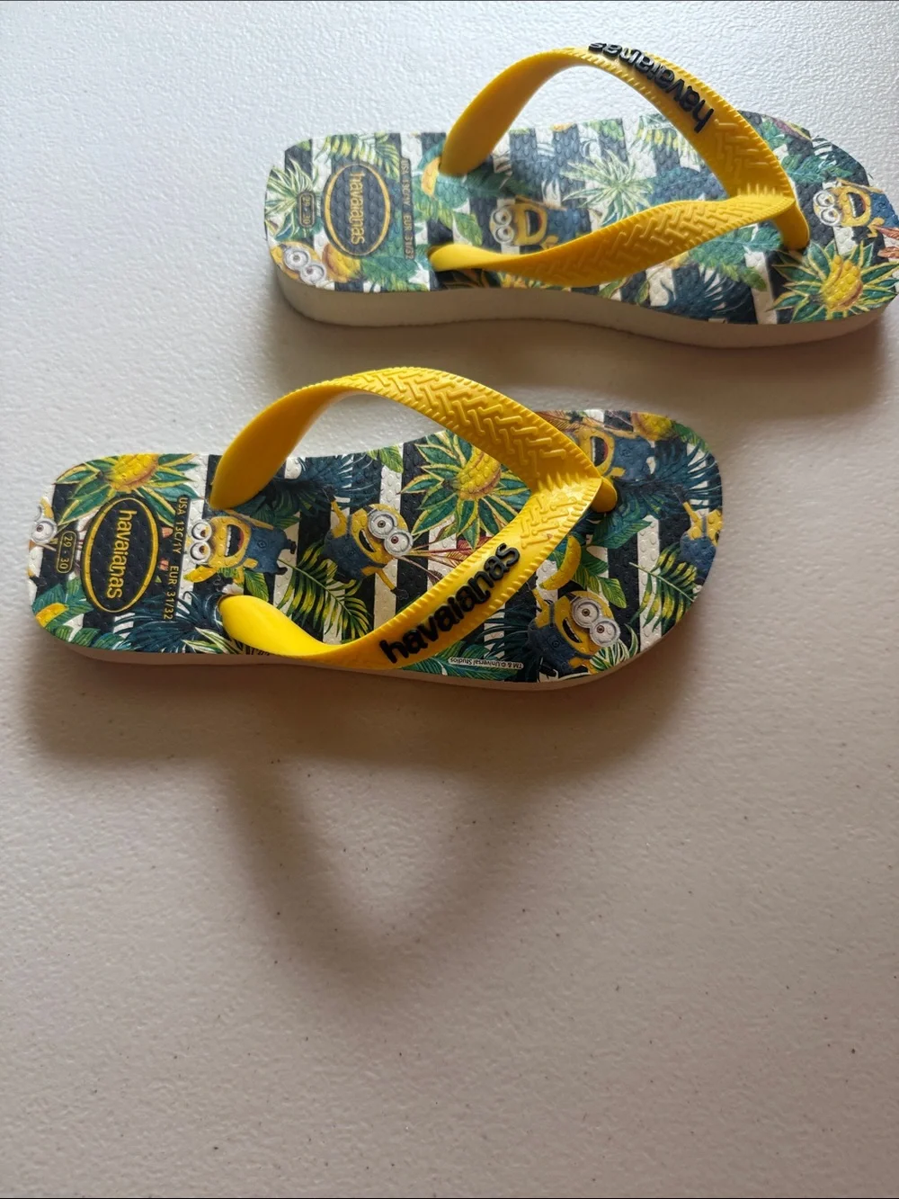 Havaianas Kids Yellow Minions Tropical Flip Flops - Green Leaf Print